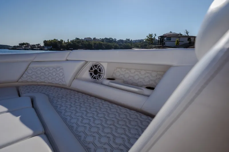 Slide: The Image of Luxurious interior of 2026 Fountain 39 DX boat with elegant seating and speaker system. - 66