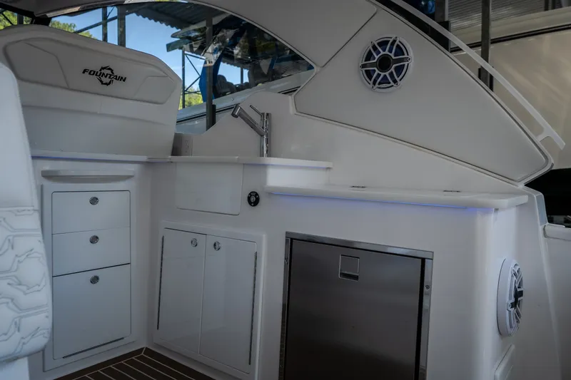 Slide: The Image of Luxurious interior of 2026 Fountain 39 DX boat with sleek cabinetry and modern fixtures. - 55
