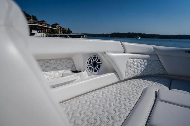 Slide: The Image of Luxurious interior of 2026 Fountain 39 DX boat with elegant white seating. - 65