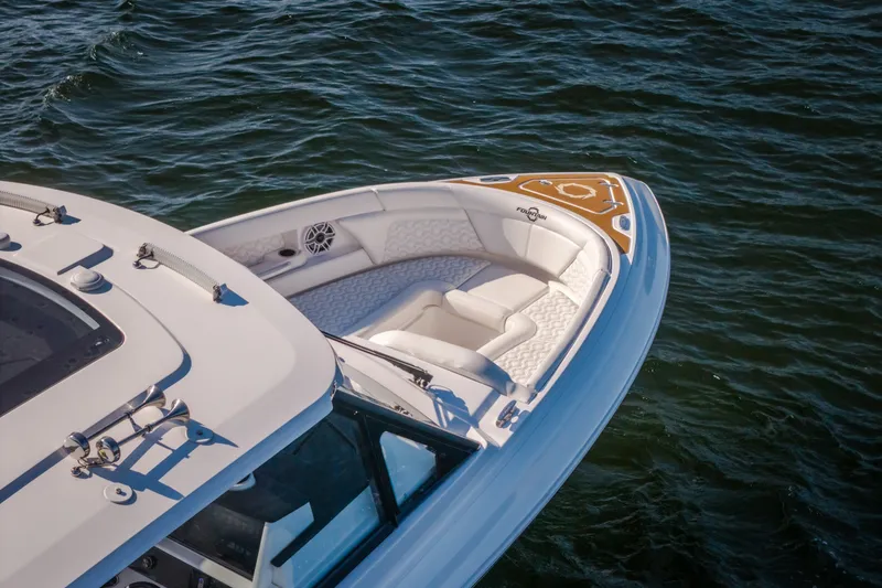 Slide: The Image of Luxury Fountain 39 DX boat, 2026 model, cruising on open water. - 14