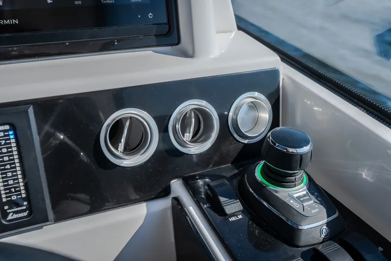 Slide: The Image of Control panel of 2026 Fountain 39 DX boat with joystick and air vents. - 31