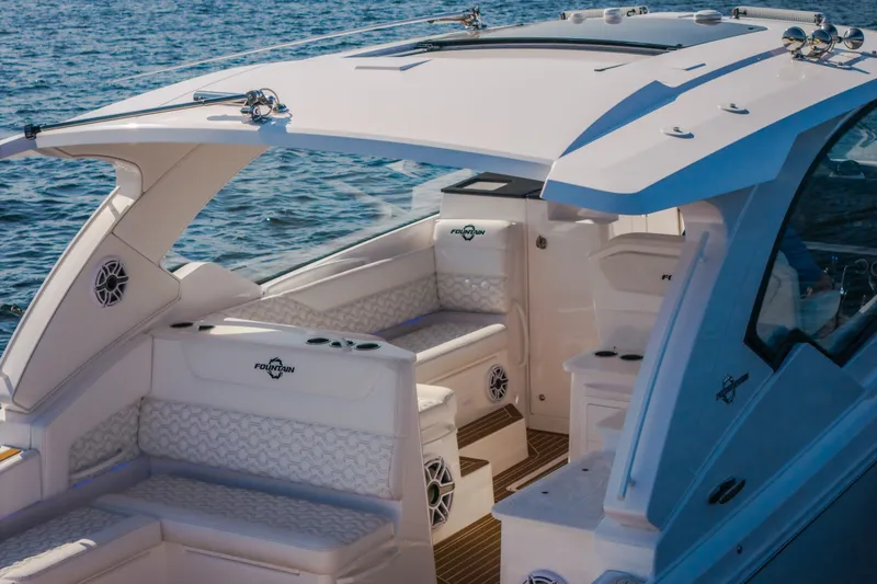 Slide: The Image of Luxury interior of 2026 Fountain 39 DX boat on open water. - 17