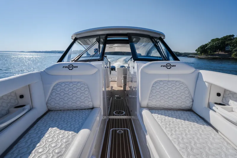Slide: The Image of Luxurious 2026 Fountain 39 DX boat interior with elegant seating on a sunny day. - 69