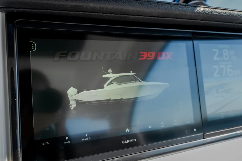 Slide: The Image of Display screen showing 2026 Fountain 39 DX boat model with Garmin interface. - 34