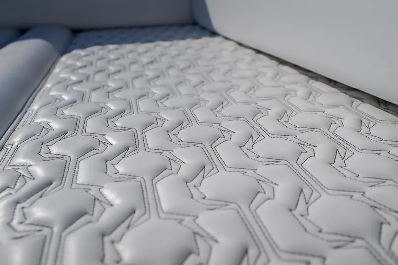 Slide: The Image of Luxurious white leather upholstery with geometric pattern in 2026 Fountain 39 DX. - 24