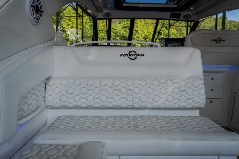 Slide: The Image of Luxurious interior seating of 2026 Fountain 39 DX boat with elegant white upholstery. - 56