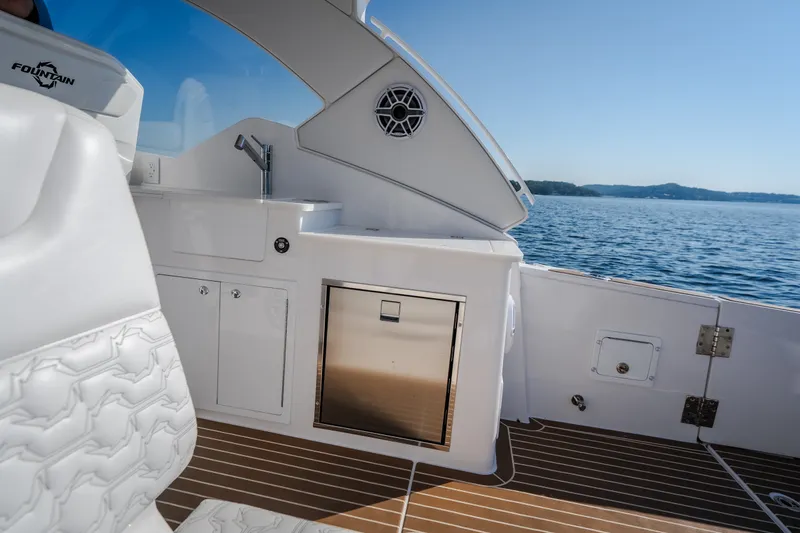 Slide: The Image of Luxury interior of 2026 Fountain 39 DX boat with sink and cabinetry. - 43