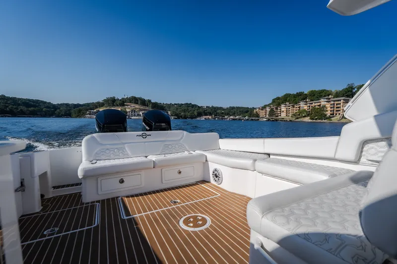 Slide: The Image of Luxurious 2026 Fountain 39 DX boat interior with scenic lake view. - 40