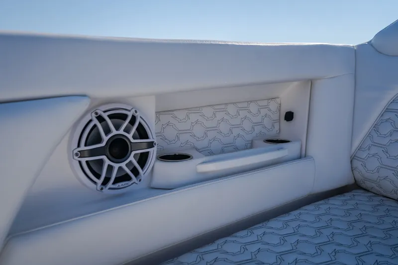 Slide: The Image of Interior of 2026 Fountain 39 DX boat with speaker and cup holders. - 71