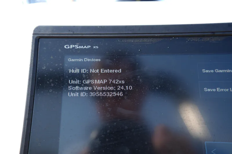 Slide: The Image of Garmin GPSMAP 742xs display on 2018 Grady-White Freedom 192 boat, showing software details. - 26