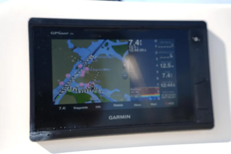 Slide: The Image of Garmin GPS display on 2018 Grady-White Freedom 192 boat, showing navigation map. - 24
