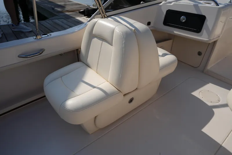 Slide: The Image of 2018 Grady-White Freedom 192 boat interior with white leather seating. - 16