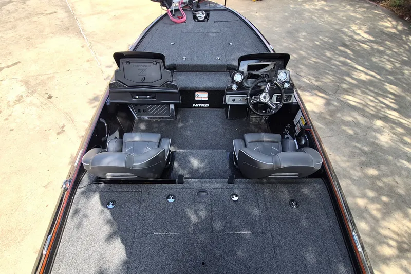 Slide: The Image of 2020 Nitro Z19 Pro boat interior with dual seats and steering console. - 10