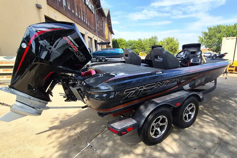 Slide: The Image of 2020 Nitro Z19 Pro boat with Mercury engine, parked outdoors on a trailer. - 6