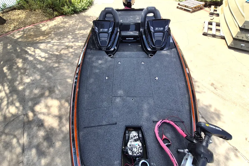 Slide: The Image of 2020 Nitro Z19 Pro boat deck with seats and trolling motor. - 13
