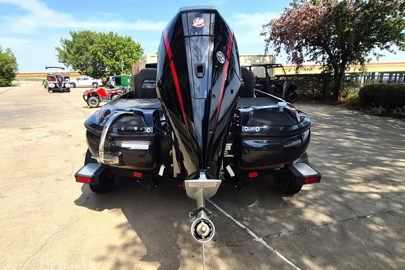 Slide: The Image of 2020 Nitro Z19 Pro boat with powerful outboard motor, parked outdoors. - 7