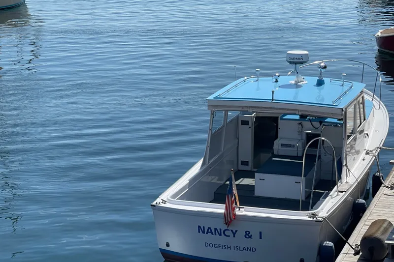 Slide: The Image of 1966 Webbers Cove 34 boat docked at Dogfish Island, named "Nancy & I". - 16