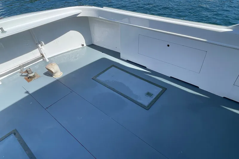 Slide: The Image of Deck of 1966 Webbers Cove 34 boat with ocean view. - 26