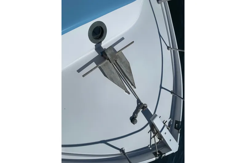 Slide: The Image of Bow of a 1966 Webbers Cove 34 boat with anchor and railing. - 19