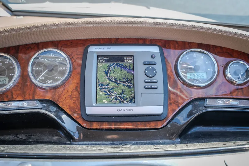 Slide: The Image of Dashboard of a 2010 Cobalt 302 boat with Garmin GPS and gauges. - 45
