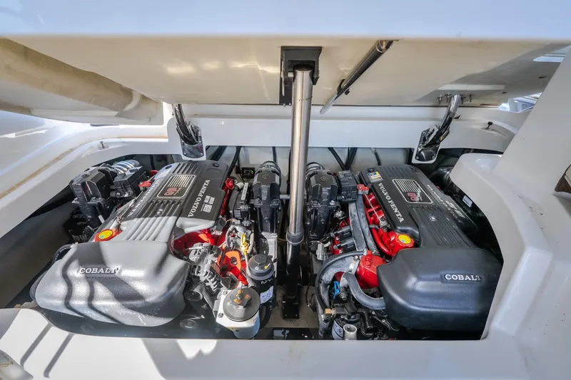 Slide: The Image of Twin Volvo Penta engines in a 2010 Cobalt 302 boat, showcasing powerful marine engineering. - 50