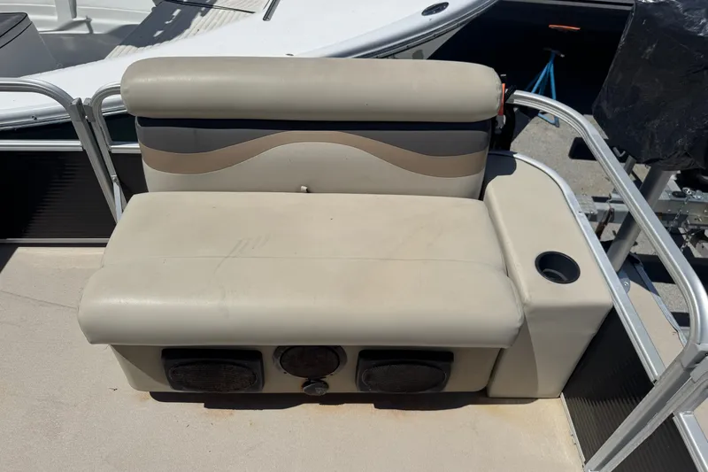 Slide: The Image of Beige seating on 2017 Godfrey Sweetwater Sunrise 22 pontoon boat with cup holder. - 5