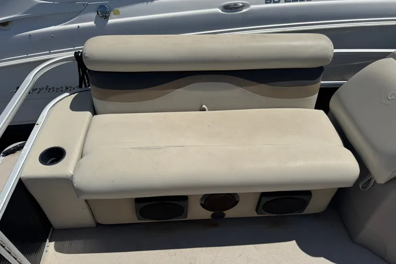 Slide: The Image of Beige seating on 2017 Godfrey Sweetwater Sunrise 22 boat with cup holder. - 6