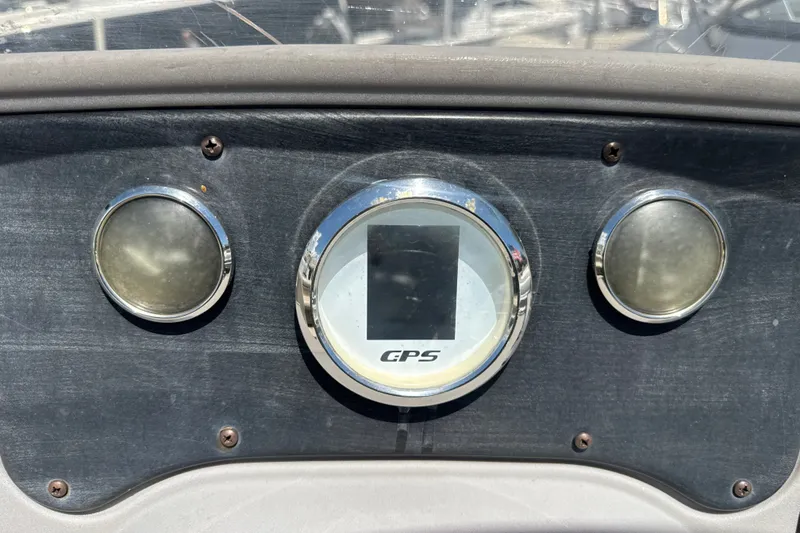Slide: The Image of Dashboard of a 2017 Godfrey Sweetwater Sunrise 22 boat with GPS display. - 13