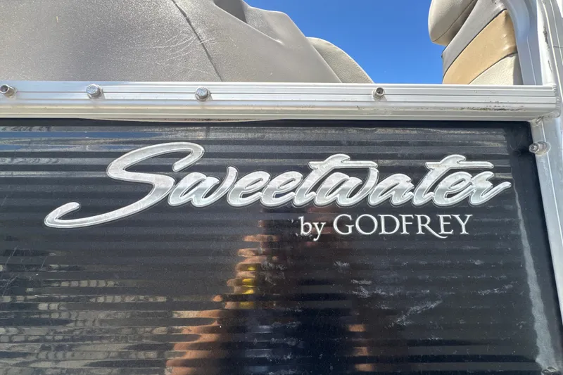 Slide: The Image of Sweetwater by Godfrey logo on 2017 Sweetwater Sunrise 22 boat. - 22