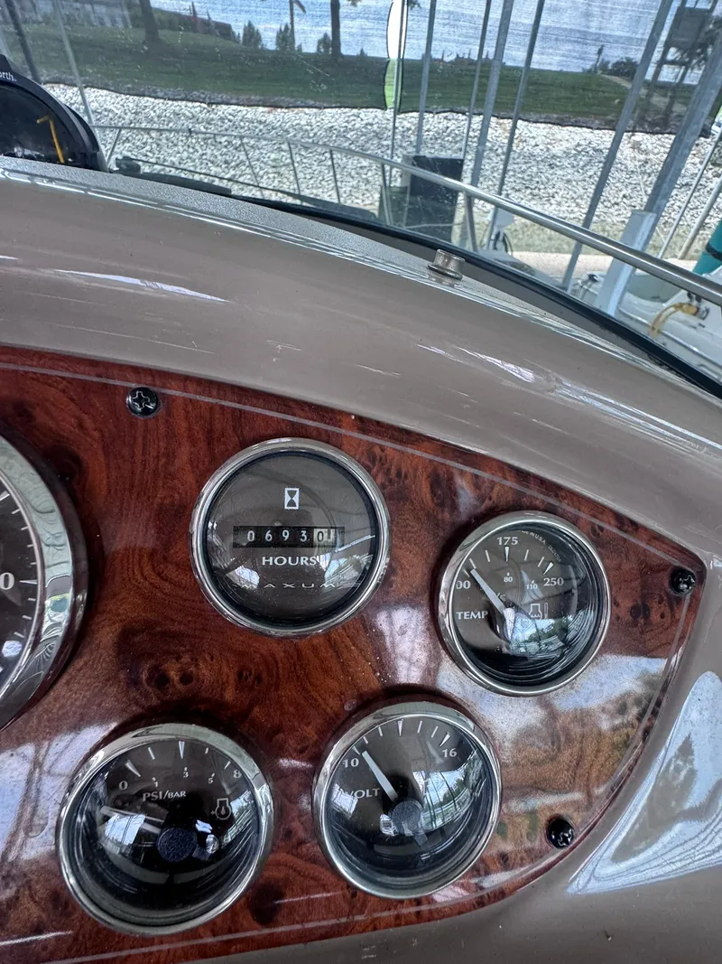 Slide: The Image of The dashboard of a 2001 Maxum 3500 SCR displays various gauges. - 20