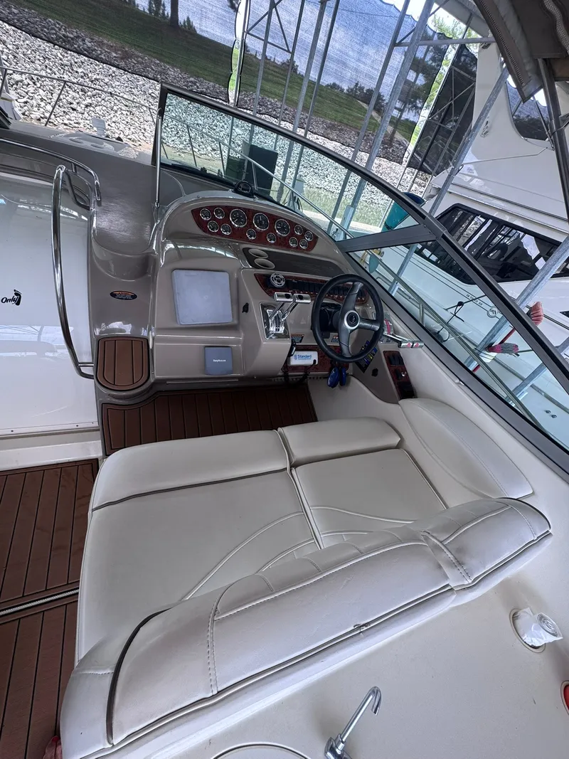 Slide: The Image of The image shows the cockpit of a 2001 Maxum 3500 SCR with a sleek helm station. - 5