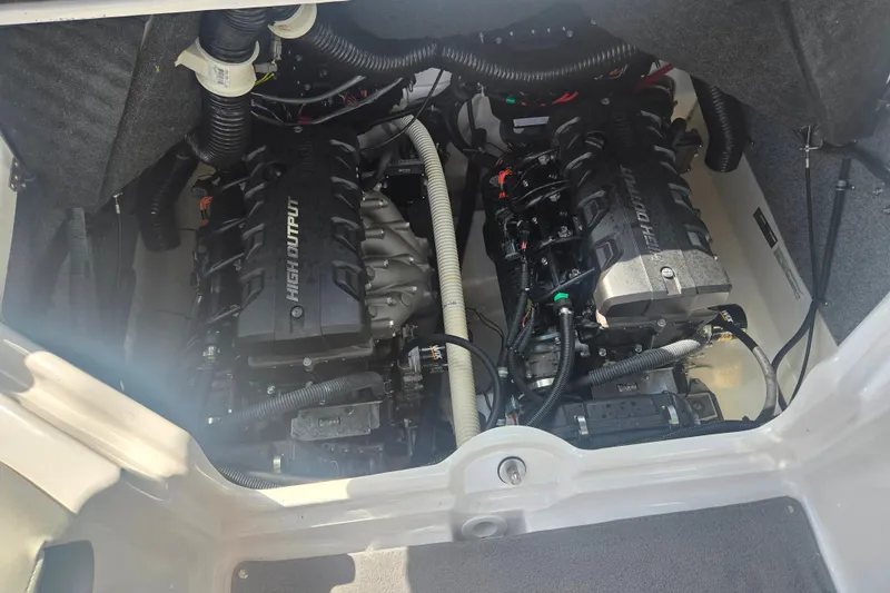 Slide: The Image of 2016 Yamaha Boats AR240 engine compartment with dual high-output engines. - 24