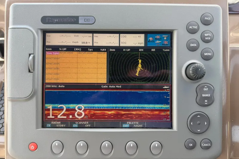 Slide: The Image of Raymarine C80 marine display showing sonar and radar data on a 2006 Regal 3360 Window Express. - 19