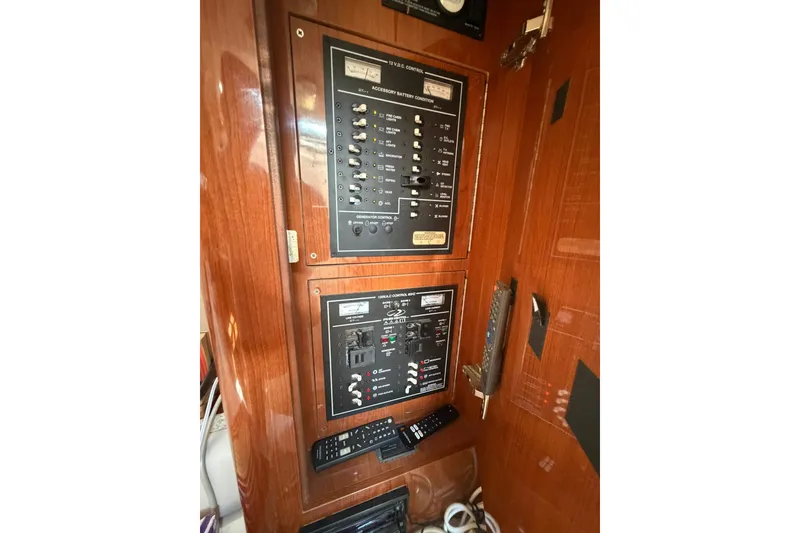 Slide: The Image of Electrical control panel inside a 2006 Regal 3360 Window Express boat. - 27