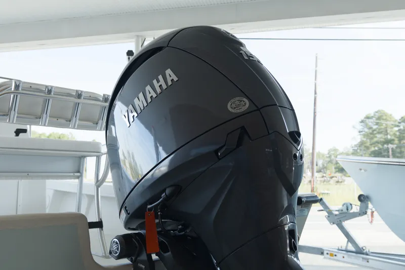 Slide: The Image of 2026 C-Hawk 20 Center Console with Yamaha outboard motor in a marina setting. - 3
