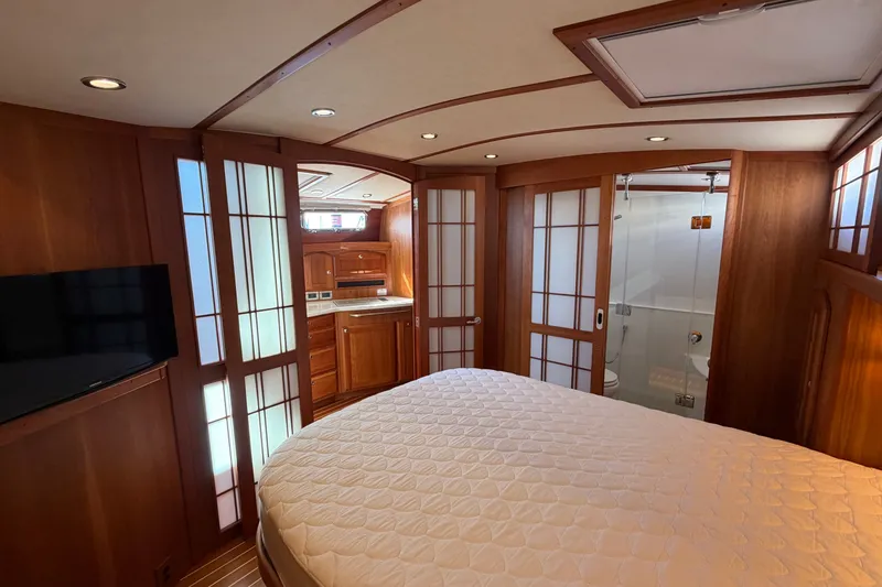 Slide: The Image of Luxurious interior of 2018 Sabre 48 Salon Express yacht with wood finish and modern amenities. - 14