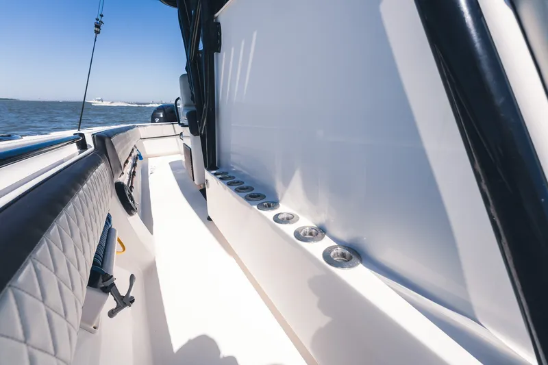 Slide: The Image of 2015 SeaHunter 37 Tournament boat deck with rod holders, ocean view. - 28