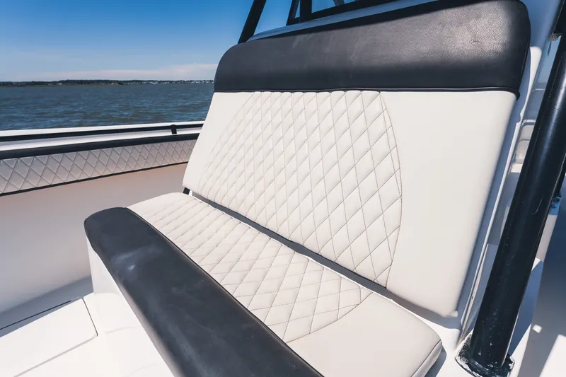 Slide: The Image of Luxurious seating on a 2015 SeaHunter 37 Tournament boat with quilted upholstery. - 25