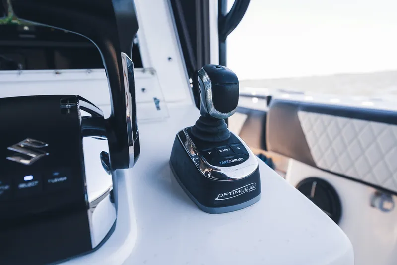 Slide: The Image of Control panel of a 2015 SeaHunter 37 Tournament boat featuring Optimus 360 joystick. - 40