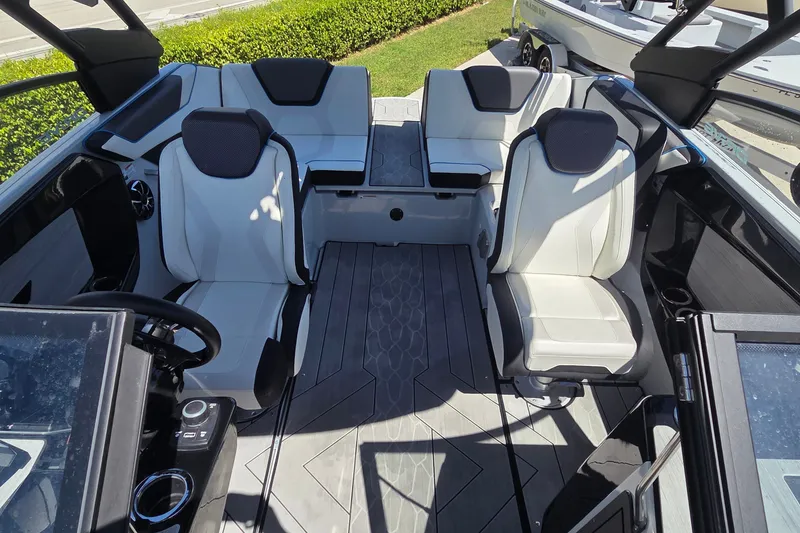 Slide: The Image of 2023 Yamaha Boats 222XD interior with modern seating and sleek design. - 21