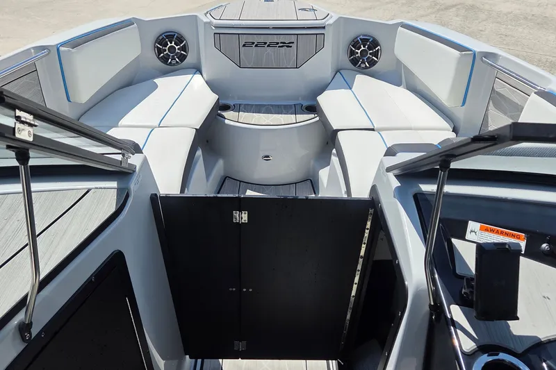 Slide: The Image of 2023 Yamaha Boats 222XD interior with sleek seating and modern design. - 15