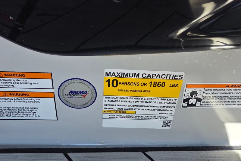 Slide: The Image of 2023 Yamaha Boats 222XD capacity label, maximum 10 persons or 1860 lbs, safety warnings visible. - 17
