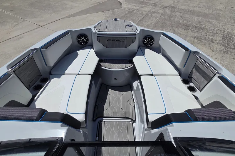 Slide: The Image of 2023 Yamaha Boats 222XD interior with spacious seating and modern design. - 14