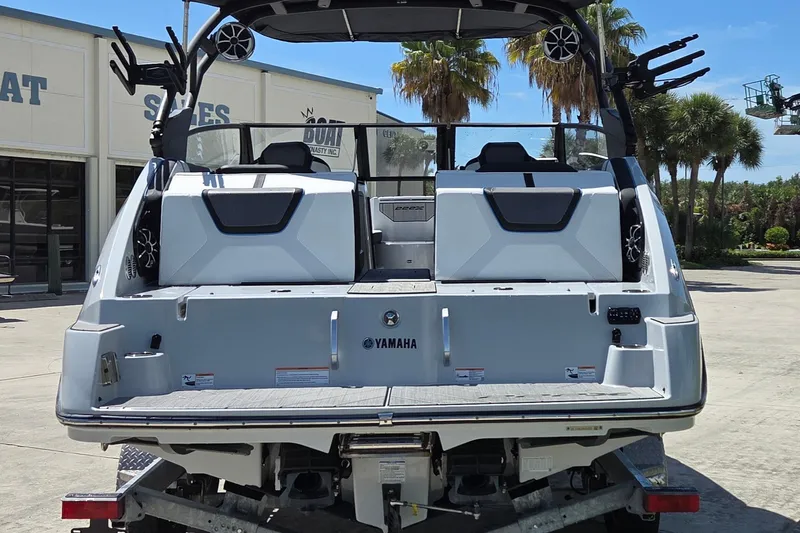 Slide: The Image of 2023 Yamaha Boats 222XD rear view, showcasing sleek design and modern features. - 4