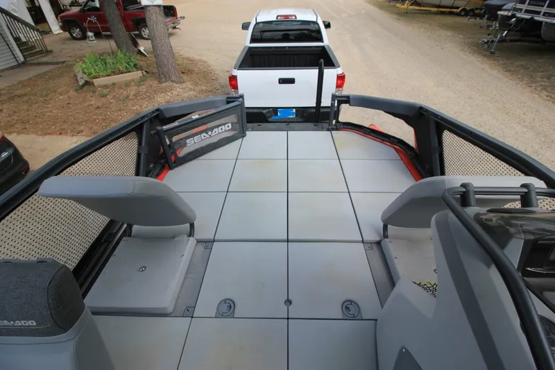 Slide: The Image of 2022 Sea-Doo Switch Sport 18 deck view, showcasing spacious layout and seating. - 19