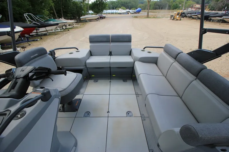Slide: The Image of Interior of 2022 Sea-Doo Switch Sport 18 pontoon boat with spacious seating. - 8