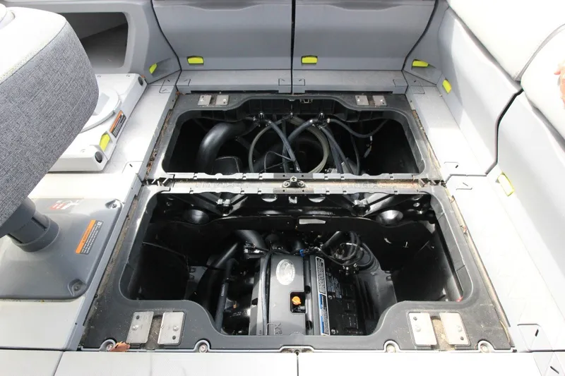 Slide: The Image of 2022 Sea-Doo Switch Sport 18 engine compartment, showcasing internal components and layout. - 22