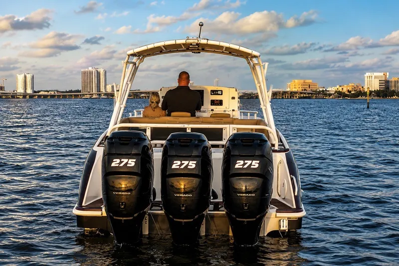 Slide: The Image of 2006 Donzi 38 ZFX Cuddy boat with triple 275 Verado engines on water. - 18