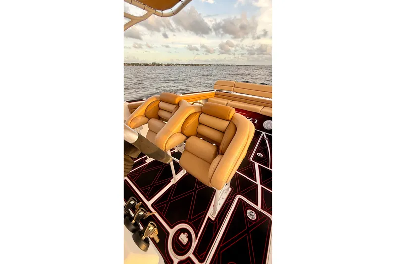 Slide: The Image of 2006 Donzi 38 ZFX Cuddy boat interior with tan seating and stylish flooring. - 38