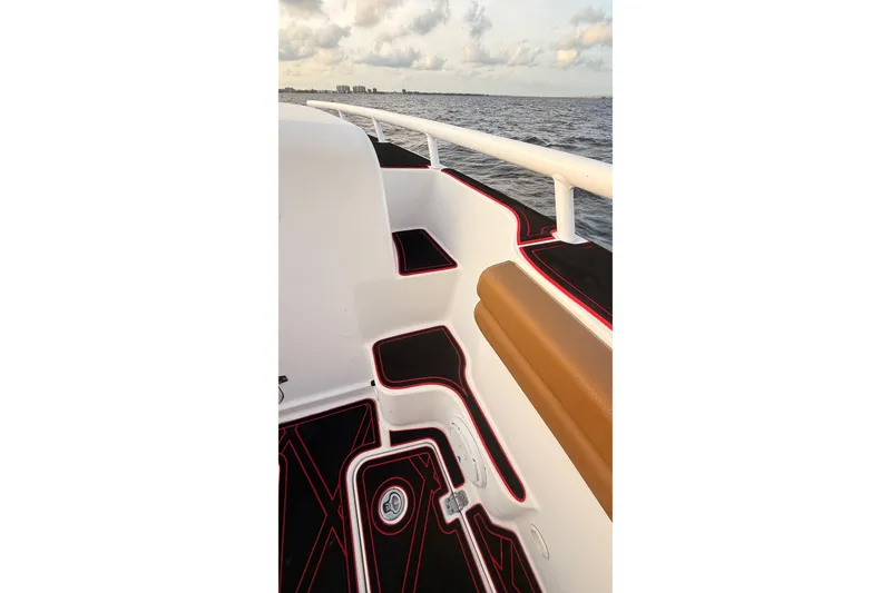 Slide: The Image of 2006 Donzi 38 ZFX Cuddy boat interior with stylish seating and ocean view. - 33